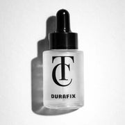 Durafix bottle with black cap on a white background