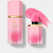 Pink lip gloss with applicator and packaging on a light gray background