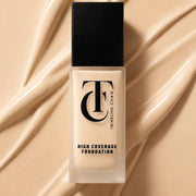Foundation bottle with 'Twinkling Cham' branding on a beige background