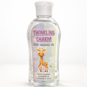 Bottle of Twinkling Charm Baby Massage Oil with a giraffe illustration on a white background