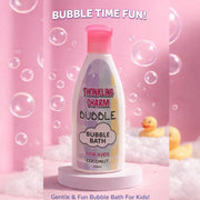 Bottle of Twinkling Charm Bubble Bath for Kids on a pink background with bubbles and a rubber duck.