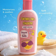 Pink bottle of Twinkling Charm baby lotion with a rubber duck and towel in the background