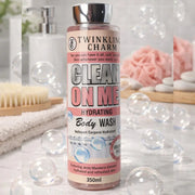 Twinkling Charm body wash bottle with bubbles and bathroom items in the background