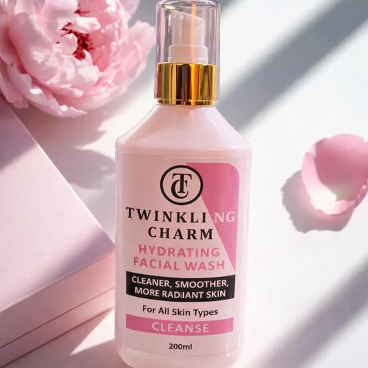 Twinkling Charm hydrating facial wash bottle with pink flowers in the background